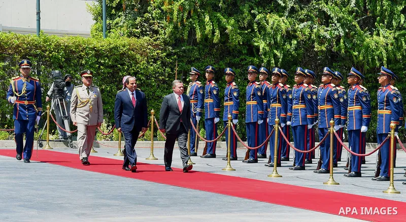 Egyptian President Abdel Fattah al-Sisi and Jordan's King Abdullah II reviewing the honor guard during a welcoming ceremony in the capital Cairo on Aug. 24, 2016. Photo by Egyptian President Office
