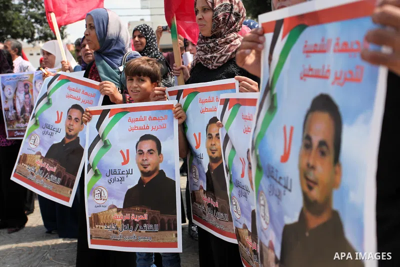 Supporters of the Popular Front for the Liberation of Palestine (PFLP) take part in a celebration of Bilal Kayed, in Gaza city on August 25, 2016. Palestinian prisoner Bilal Kayid has suspended his hunger strike after sp...