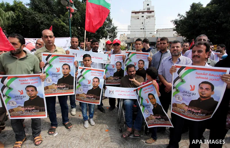 Supporters of the Popular Front for the Liberation of Palestine (PFLP) take part in a celebration of Bilal Kayed, in Gaza city on August 25, 2016. Palestinian prisoner Bilal Kayid has suspended his hunger strike after sp...