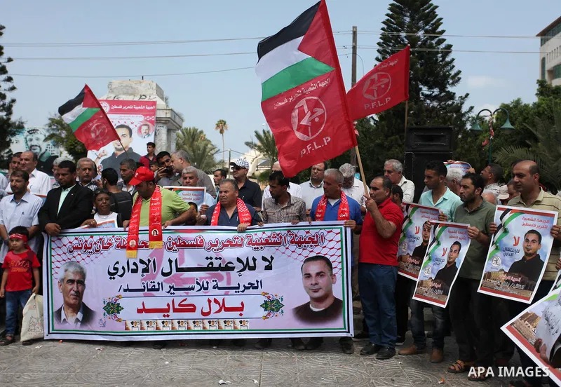 Supporters of the Popular Front for the Liberation of Palestine (PFLP) take part in a celebration of Bilal Kayed, in Gaza city on August 25, 2016. Palestinian prisoner Bilal Kayid has suspended his hunger strike after sp...