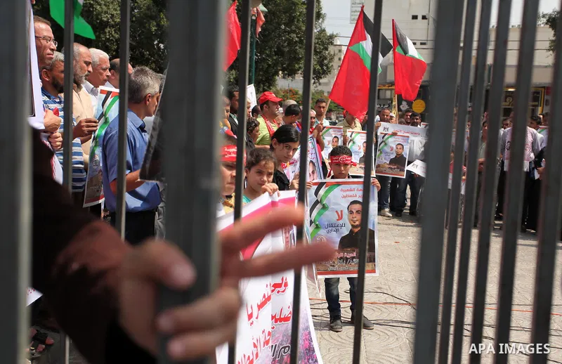 Supporters of the Popular Front for the Liberation of Palestine (PFLP) take part in a celebration of Bilal Kayed, in Gaza city on August 25, 2016. Palestinian prisoner Bilal Kayid has suspended his hunger strike after sp...