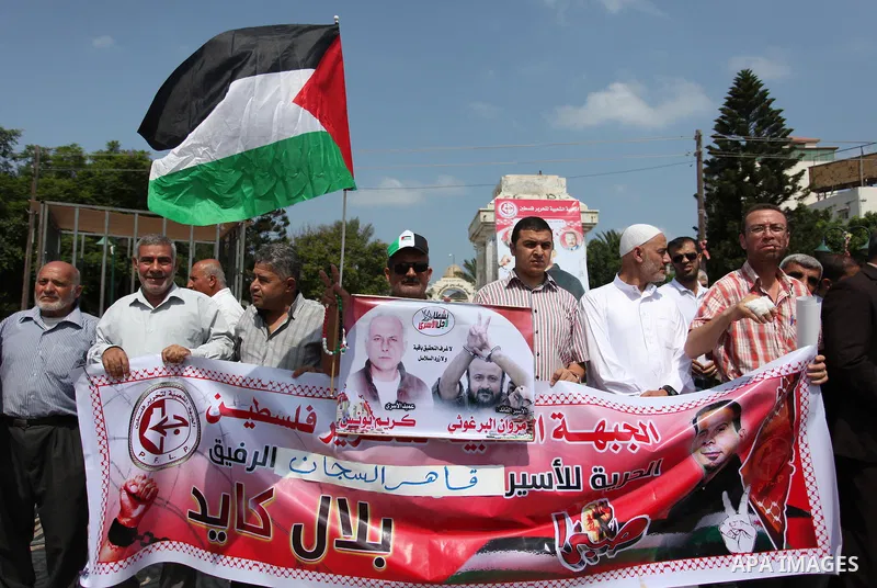 Supporters of the Popular Front for the Liberation of Palestine (PFLP) take part in a celebration of Bilal Kayed, in Gaza city on August 25, 2016. Palestinian prisoner Bilal Kayid has suspended his hunger strike after sp...