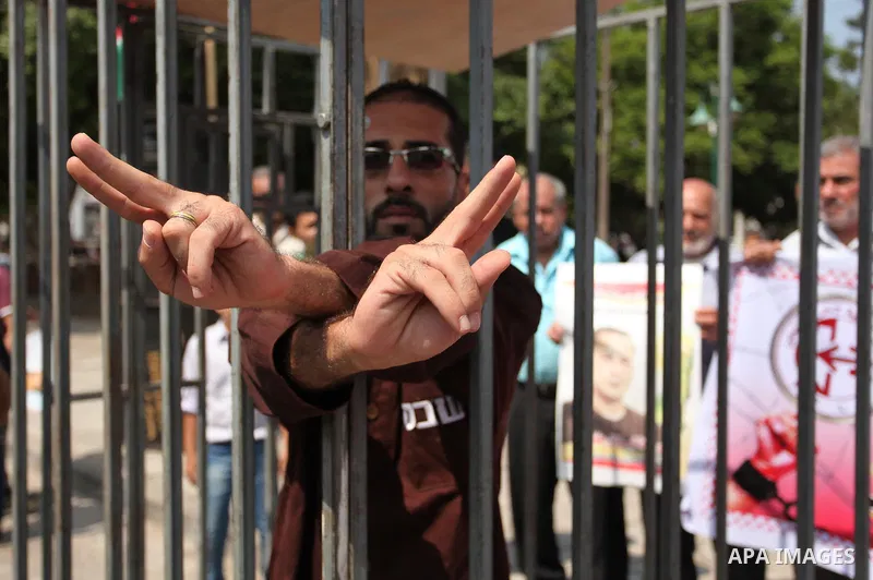 Supporters of the Popular Front for the Liberation of Palestine (PFLP) take part in a celebration of Bilal Kayed, in Gaza city on August 25, 2016. Palestinian prisoner Bilal Kayid has suspended his hunger strike after sp...