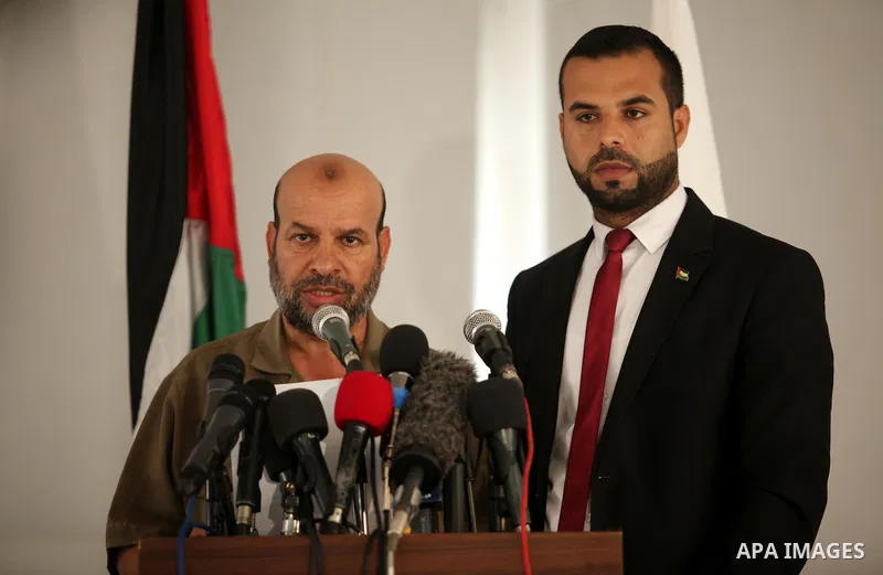 Palestinian undersecretary of the Interior Ministry, Kamel Abu Madi, and Eyad al-Bozm, the spokesman of the Palestinian Ministry of the Interior, speak during a press conference on the Central Election Commission, in Gaz...