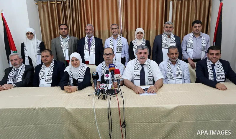 Palestinian members of Gaza Hashim, an electoral list for the upcoming Gaza municipality polls, hold a press conference in Gaza city, on Aug. 25, 2016. Photo by Mohammed Asad