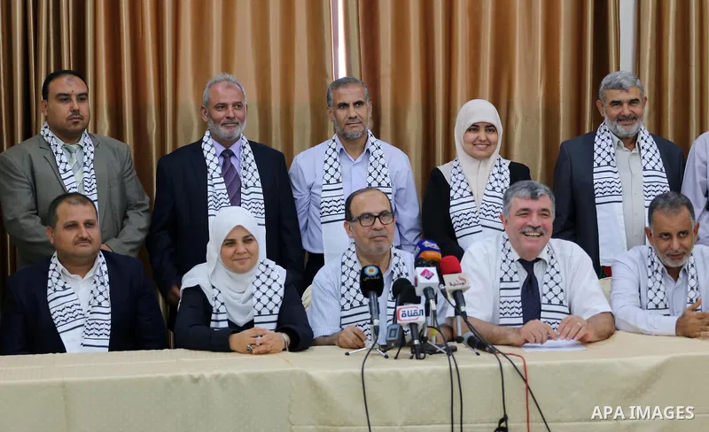 Palestinian members of Gaza Hashim, an electoral list for the upcoming Gaza municipality polls, hold a press conference in Gaza city, on Aug. 25, 2016. Photo by Mohammed Asad