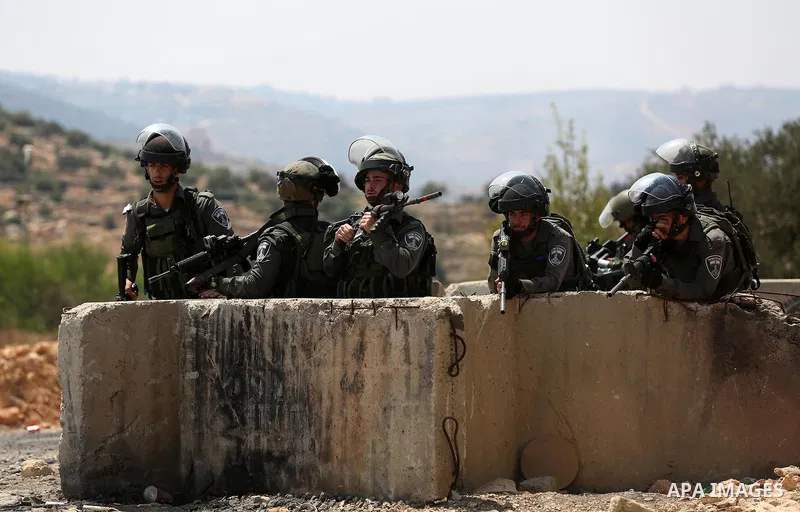 Israeli border policemen stand guard at the scene where a Palestinian was shot and killed by Israeli forces in the West Bank village of Silwad near Ramallah August 26, 2016. Silwad, close to the Jewish settlement of Ofra...