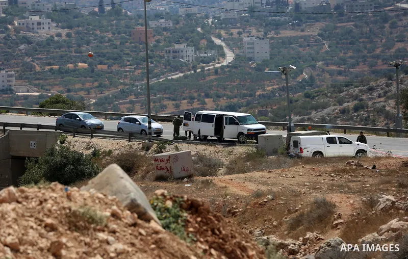 Israeli soldiers inspect the scene where a Palestinian was shot and killed by Israeli forces in the West Bank village of Silwad near Ramallah August 26, 2016. Silwad, close to the Jewish settlement of Ofra, is under cons...