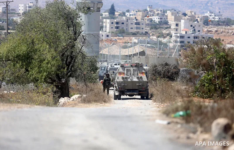 Israeli troops gather at the scene where a Palestinian was shot and killed by Israeli forces in the West Bank village of Silwad near Ramallah August 26, 2016. Silwad, close to the Jewish settlement of Ofra, is under cons...