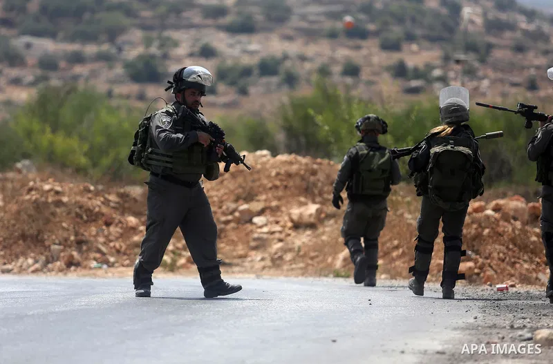 Israeli border policemen stand guard at the scene where a Palestinian was shot and killed by Israeli forces in the West Bank village of Silwad near Ramallah August 26, 2016. Silwad, close to the Jewish settlement of Ofra...