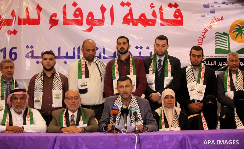 Palestinian members of El-wafa' of Deir al-Balah, an electoral list for the upcoming Gaza municipality polls, hold a press conference in Deir Al Balah in the center of Gaza strip, on Aug. 27, 2016. Photo by Ashraf Amra