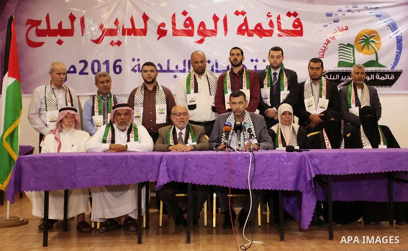 Palestinian members of El-wafa' of Deir al-Balah, an electoral list for the upcoming Gaza municipality polls, hold a press conference in Deir Al Balah in the center of Gaza strip, on Aug. 27, 2016. Photo by Ashraf Amra