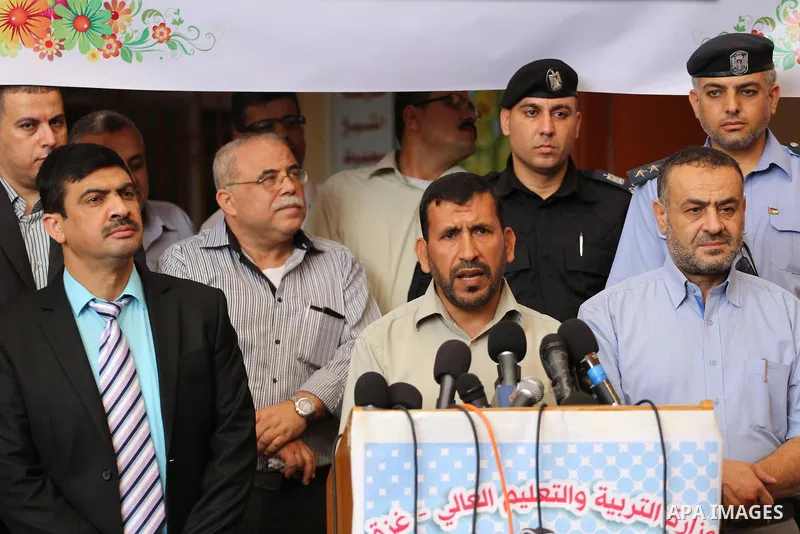 Undersecretary of the Ministry of Education, Ziad Thabet, speaks during a press conference at a school, in Gaza city, on August 28, 2016. Photo by Mohammed Asad