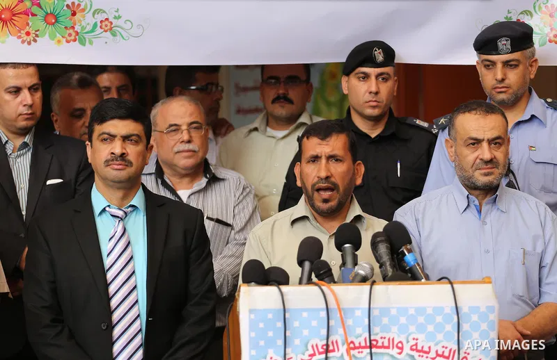 Undersecretary of the Ministry of Education, Ziad Thabet, speaks during a press conference at a school, in Gaza city, on August 28, 2016. Photo by Mohammed Asad
