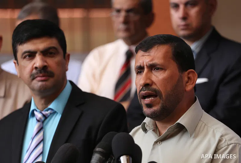 Undersecretary of the Ministry of Education, Ziad Thabet, speaks during a press conference at a school, in Gaza city, on August 28, 2016. Photo by Mohammed Asad