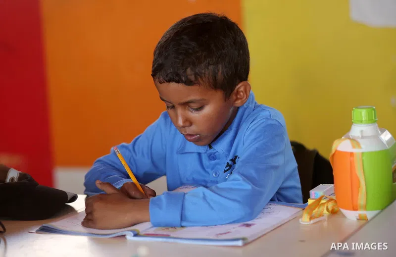 A Palestinian Bedouin Student learns at Arab Al-Ka'abneh school in Al-Mu'arrajat area near the West Bank city of Jericho, on the first day of a new school year on Aug. 28, 2016. Dozens of Palestinian children in the rams...