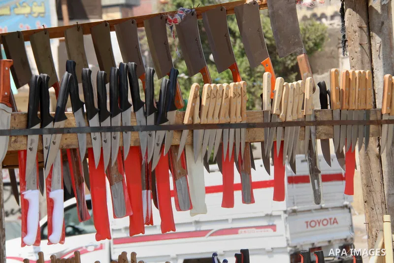 An Egyptian vendor displays grinded knives, ahead of Eid al-Adha ahead of Eid al-Adha in Cairo, Egypt on Aug. 29, 2016. Eid al-Adha (the Festival of Sacrifice) is celebrated throughout the Muslim world as a commemoration...