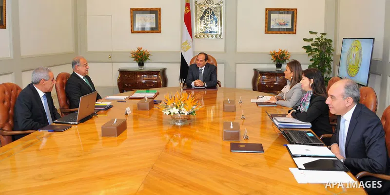 Egyptian President Abdel Fattah al-Sisi meets with Egyptian Prime Minister Sharif Ismail in Cairo, Egypt, on Aug. 29, 2016. Photo by Egyptian President Office