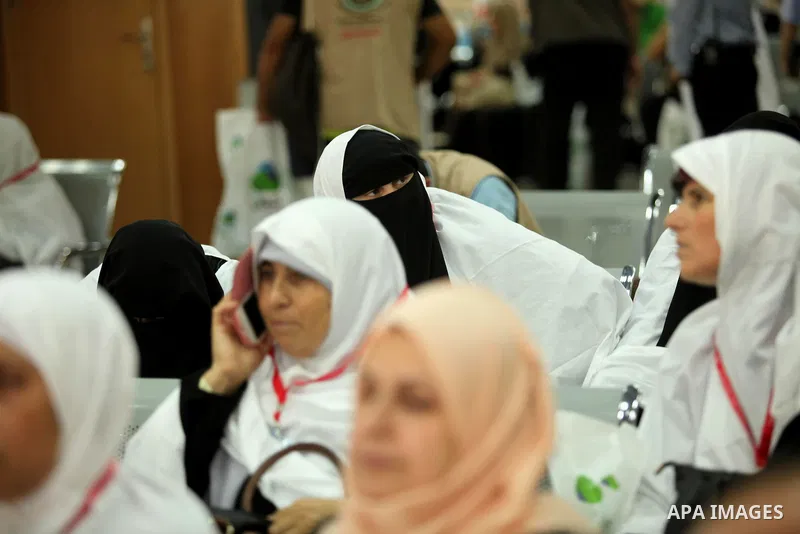 Palestinian Muslim pilgrims wait at the Rafah border crossing between Egypt and the southern Gaza Strip, on August 30, 2016 ahead of their departure to the annual Hajj pilgrimage in Saudi Arabia's holy city of Mecca. Pho...