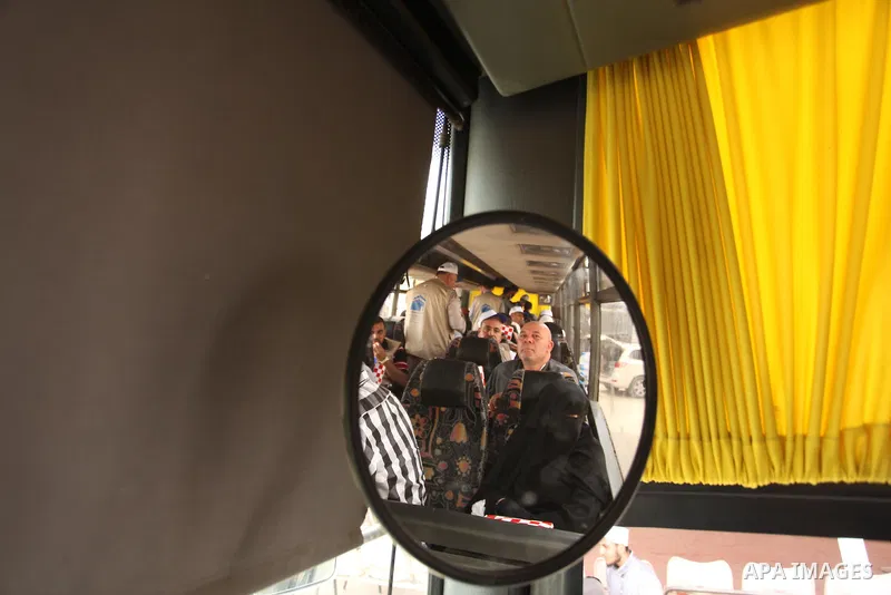 Palestinian Muslim pilgrims wait in a bus before leaving the Rafah border crossing between Egypt and the southern Gaza Strip, on August 30, 2016, ahead of her departure to the annual Hajj pilgrimage in Saudi Arabia's hol...