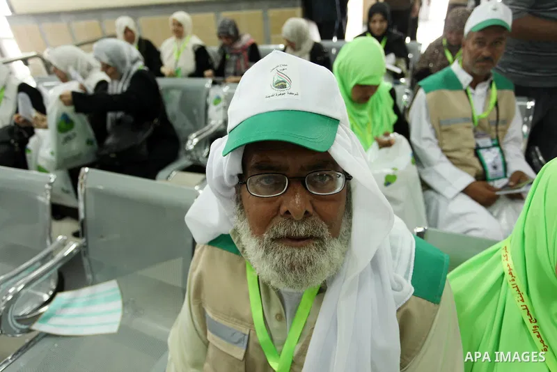 Palestinian Muslim pilgrims wait at the Rafah border crossing between Egypt and the southern Gaza Strip, on August 30, 2016 ahead of their departure to the annual Hajj pilgrimage in Saudi Arabia's holy city of Mecca. Pho...