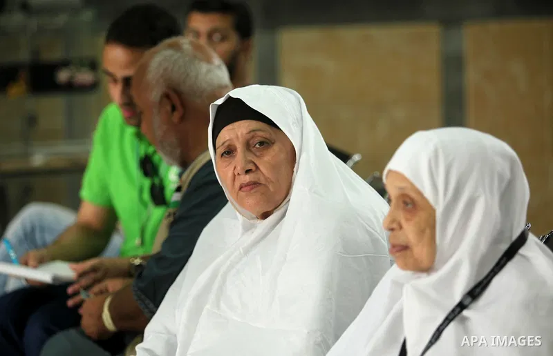 Palestinian Muslim pilgrims wait at the Rafah border crossing between Egypt and the southern Gaza Strip, on August 30, 2016 ahead of their departure to the annual Hajj pilgrimage in Saudi Arabia's holy city of Mecca. Pho...