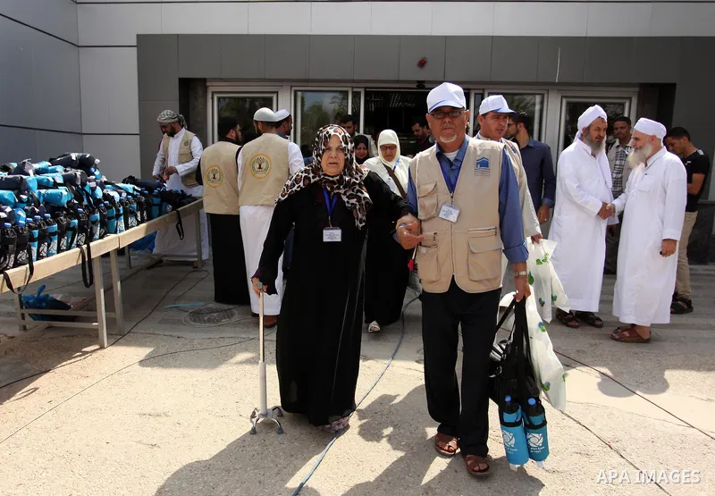 Palestinian Muslim pilgrims arrive at the Rafah border crossing between Egypt and the southern Gaza Strip, on August 30, 2016 ahead of their departure to the annual Hajj pilgrimage in Saudi Arabia's holy city of Mecca. P...