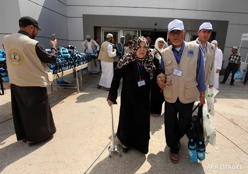 Palestinian Muslim pilgrims arrive at the Rafah border crossing between Egypt and the southern Gaza Strip, on August 30, 2016 ahead of their departure to the annual Hajj pilgrimage in Saudi Arabia's holy city of Mecca. P...