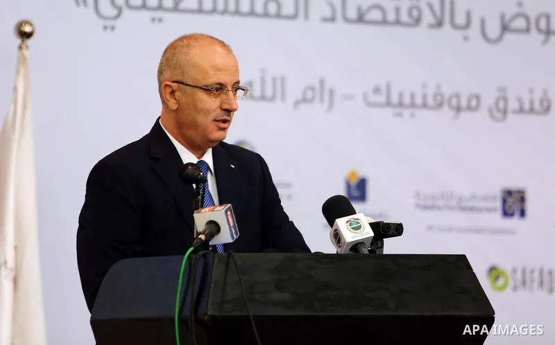 Palestinian Prime Minister, Rami Hamadallah, attends Economic MAS conference 2016, in the West Bank city of Ramallah, on Aug 31, 2016. Photo by Prime Minister Office