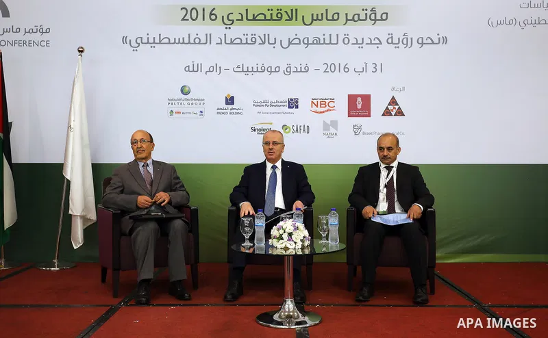 Palestinian Prime Minister, Rami Hamadallah, attends Economic MAS conference 2016, in the West Bank city of Ramallah, on Aug 31, 2016. Photo by Prime Minister Office