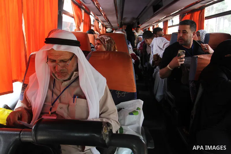 Palestinians wait in a bus before leaving the Rafah border crossing between Egypt and the southern Gaza Strip, on August 31, 2016, ahead of her departure to the annual Hajj pilgrimage in Saudi Arabia's holy city of Mecca...