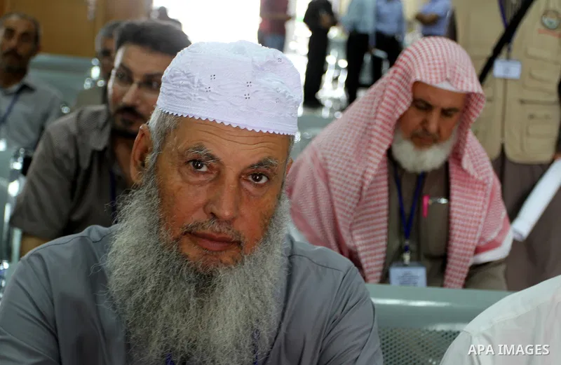 Palestinian Muslim pilgrims wait at the Rafah border crossing between Egypt and the southern Gaza Strip, on August 31, 2016 ahead of their departure to the annual Hajj pilgrimage in Saudi Arabia's holy city of Mecca. Pho...