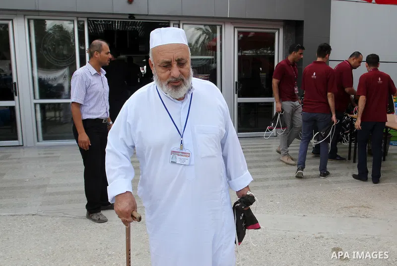 Palestinian Muslim pilgrims arrive at the Rafah border crossing between Egypt and the southern Gaza Strip, on August 31, 2016 ahead of their departure to the annual Hajj pilgrimage in Saudi Arabia's holy city of Mecca. P...