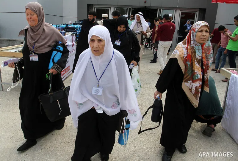 Palestinian Muslim pilgrims arrive at the Rafah border crossing between Egypt and the southern Gaza Strip, on August 31, 2016 ahead of their departure to the annual Hajj pilgrimage in Saudi Arabia's holy city of Mecca. P...