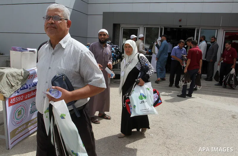 Palestinian Muslim pilgrims arrive at the Rafah border crossing between Egypt and the southern Gaza Strip, on August 31, 2016 ahead of their departure to the annual Hajj pilgrimage in Saudi Arabia's holy city of Mecca. P...