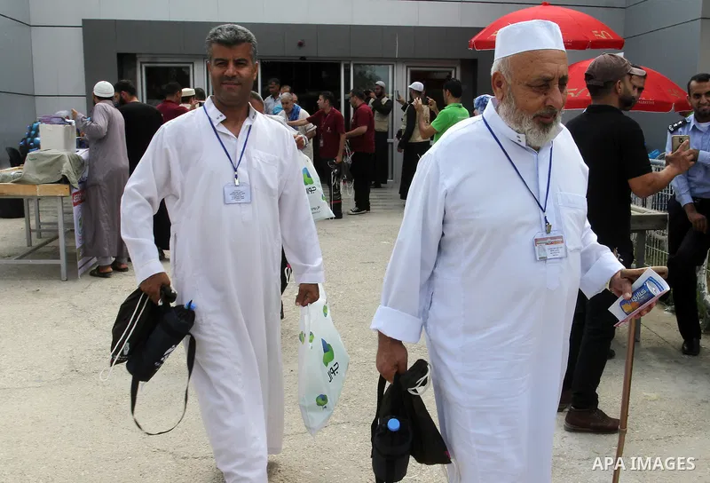 Palestinian Muslim pilgrims arrive at the Rafah border crossing between Egypt and the southern Gaza Strip, on August 31, 2016 ahead of their departure to the annual Hajj pilgrimage in Saudi Arabia's holy city of Mecca. P...