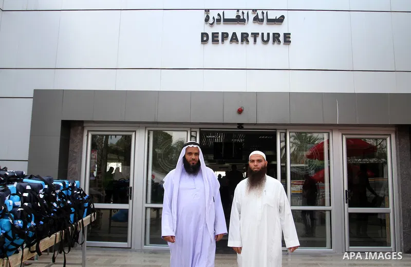 Palestinian Muslim pilgrims arrive at the Rafah border crossing between Egypt and the southern Gaza Strip, on August 31, 2016 ahead of their departure to the annual Hajj pilgrimage in Saudi Arabia's holy city of Mecca. P...