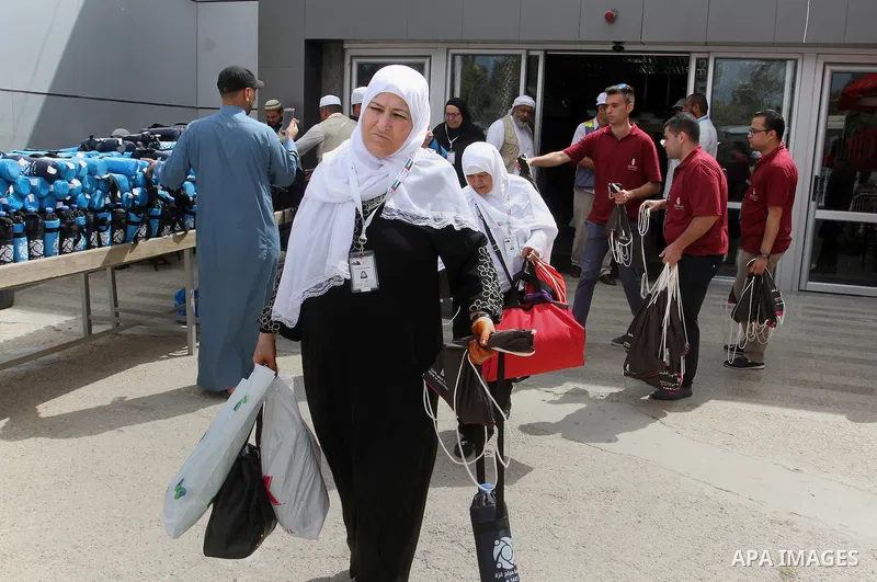 Palestinian Muslim pilgrims arrive at the Rafah border crossing between Egypt and the southern Gaza Strip, on August 31, 2016 ahead of their departure to the annual Hajj pilgrimage in Saudi Arabia's holy city of Mecca. P...