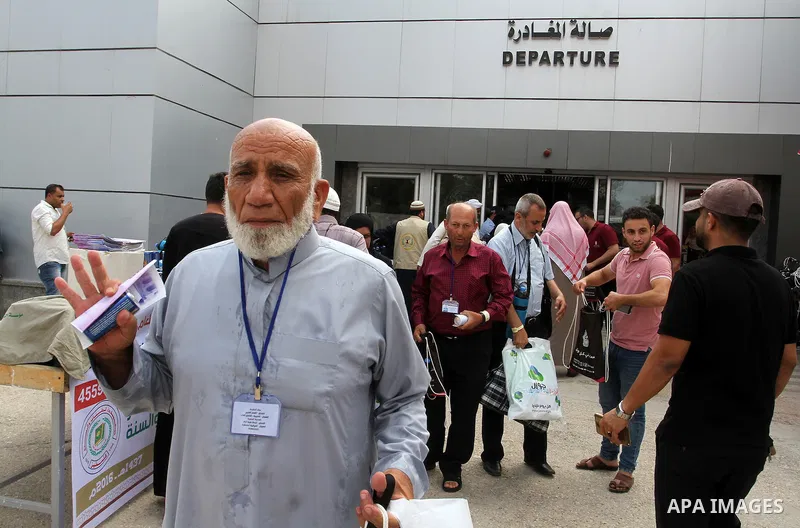 Palestinian Muslim pilgrims arrive at the Rafah border crossing between Egypt and the southern Gaza Strip, on August 31, 2016 ahead of their departure to the annual Hajj pilgrimage in Saudi Arabia's holy city of Mecca. P...
