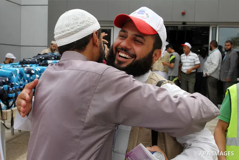 Palestinian Muslim pilgrims arrive at the Rafah border crossing between Egypt and the southern Gaza Strip, on August 31, 2016 ahead of their departure to the annual Hajj pilgrimage in Saudi Arabia's holy city of Mecca. P...