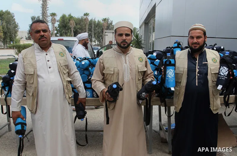 Palestinian Muslim pilgrims arrive at the Rafah border crossing between Egypt and the southern Gaza Strip, on August 31, 2016 ahead of their departure to the annual Hajj pilgrimage in Saudi Arabia's holy city of Mecca. P...