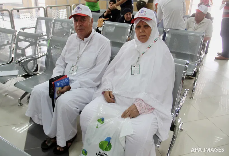 Palestinian Muslim pilgrims wait at the Rafah border crossing between Egypt and the southern Gaza Strip, on August 31, 2016 ahead of their departure to the annual Hajj pilgrimage in Saudi Arabia's holy city of Mecca. Pho...