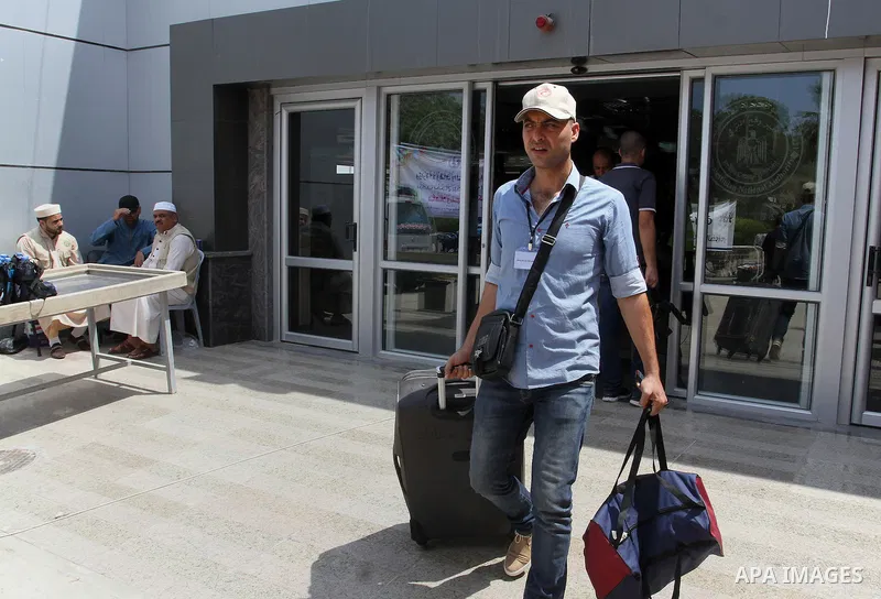 Palestinian Muslim pilgrims arrive at the Rafah border crossing between Egypt and the southern Gaza Strip, on August 31, 2016 ahead of their departure to the annual Hajj pilgrimage in Saudi Arabia's holy city of Mecca. P...