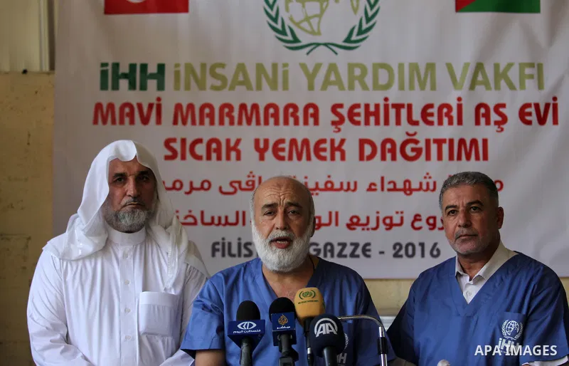 Chairman of Turkish humanitarian relief (IHH), Mohammed Kaya, speaks during the opening ceremony of a kitchen martyrs of the Freedom Flotilla (Mavi Marmara), which provides free meals for poor families, in Gaza city, on...