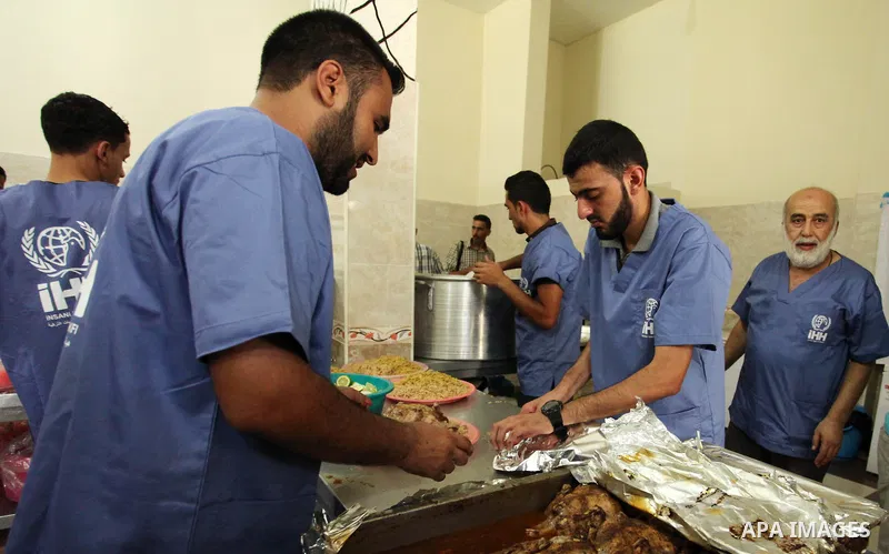 Chairman of Turkish humanitarian relief (IHH), Mohammed Kaya, attends the opening ceremony of a kitchen martyrs of the Freedom Flotilla (Mavi Marmara), which provides free meals for poor families, in Gaza city, on Sept....