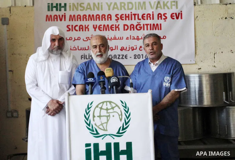 Chairman of Turkish humanitarian relief (IHH), Mohammed Kaya, speaks during the opening ceremony of a kitchen martyrs of the Freedom Flotilla (Mavi Marmara), which provides free meals for poor families, in Gaza city, on...