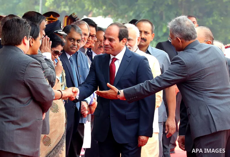 Egypt's President Abdel Fattah al-Sisi prepares to shake hand with officials during the ceremonial reception at presidential palace in New Delhi on September 2, 2016. al-Sisi is on a three-day state visit in India. Photo...