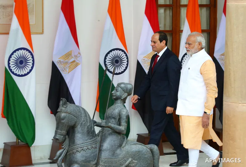 Indian Prime Minister Narendra Modi arrives with Egyptian President Abdel Fattah al-Sisi for a meeting at Hyderabad House in New Delhi on September 2, 2016. al-Sisi is on a three-day state visit in India. Photo by Egypti...