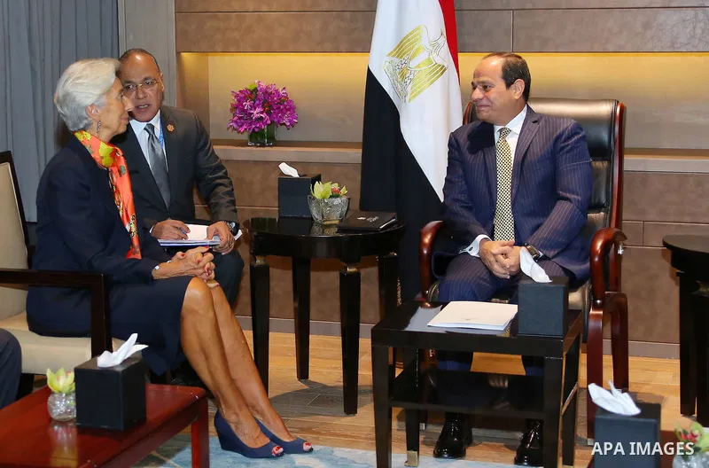 Egyptian President Abdel Fattah el-Sisi (C) and Foreign Minister of Egypt Sameh Shoukry (R) meet with Managing Director of the International Monetary Fund (IMF) Christine Lagarde (L) during their meeting as part of the G...
