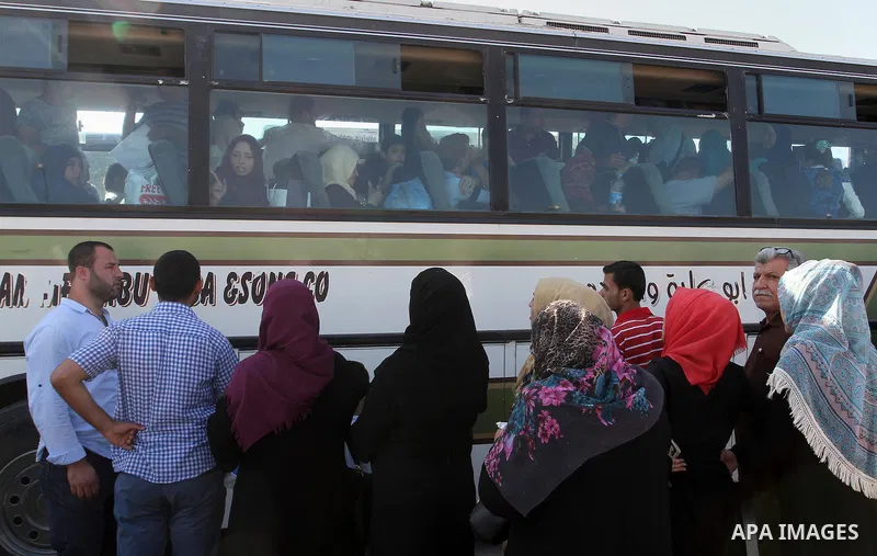 Palestinians wait for travel permits to cross into Egypt through the Rafah border crossing, on September 4, 2016 in the southern Gaza Strip. Egyptian authorities temporarily reopened it both directions for two days in Ga...